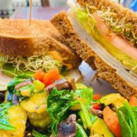 Turkey Avocado Sandwich  · Whole Wheat Toast, Smoked Turkey, Whole Wheat Toast, Tomato, Alfalfa Sprouts, Chipotle Mayo....