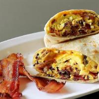 Bacon Breakfast Burrito · Scrambled eggs, bacon, tater tots, cheddar, flour, or whole wheat tortilla.