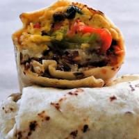 Grilled Vegetable Breakfast Burrito · Scrambled eggs, tater tots, peppers, mushrooms, spinach, onion, cheddar, flour, or whole whe...