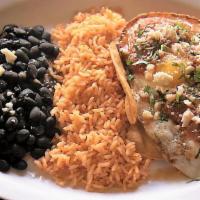 Huevos Rancheros · Two eggs any style over crispy corn tortillas with Spanish rice, black beans, salsa, queso f...