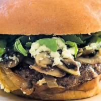 Frenchy Burger · Arugula, caramelized onions, sautéed mushrooms, Bleu cheese on a buttered brioche bun. Cooke...