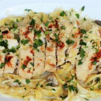 Grilled Chicken Fettuccine Alfredo · Fettuccine pasta, sautéed mushrooms, garlic cream sauce, grilled chicken breast.