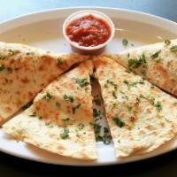 Cheese Quesadilla · Grilled flour tortilla, melted cheese, side of salsa.