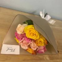 Rainbow · 1 dozen mixed  color roses in a custom wrap