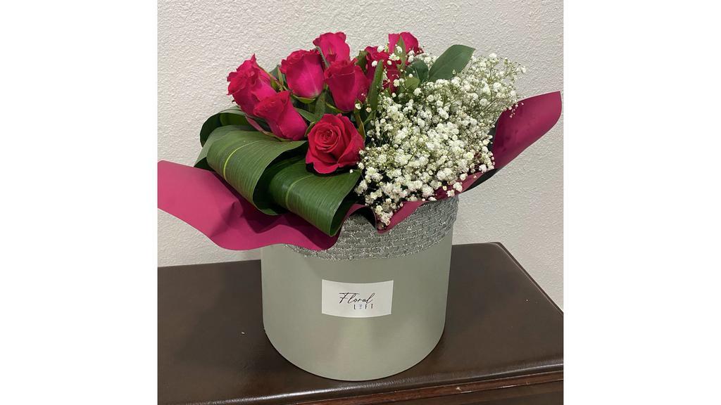 Grand Box · 1 dozen roses and babies breath with greens in large box. You can choose what color you want the roses in special instructions or it will be designers choice of what is available.
