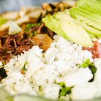 Cobb Salad · Spring mix, grilled chicken, blue cheese crumbles, bacon bits, avocado, chopped eggs, and di...