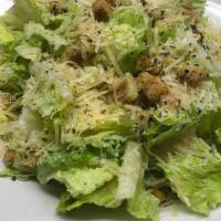 Large Caesar Salad · Romaine lettuce, croutons, and fresh parmesan cheese. Tossed with creamy Caesar dressing.
