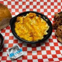 Lil Pull · A smaller portion of our tasty and tender pulled pork, with a side of your choice and a dinn...