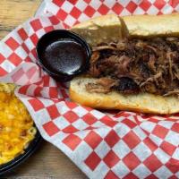 Pulled Pork Sandwich · Indulge yourself with our highly addictive Pulled Pork stuffed in a soft 6 inch hoagie roll,...