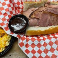 Smoked Ham Sandwich · Our slowly smoked ham, sliced to perfection and stuffed in a 6 inch hoagie roll. Includes a ...