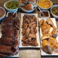 Backyard Boogie (12-14 People) · Your choice of three meats (2 lbs each), your choice of three XL sides (32oz each), and 14 d...