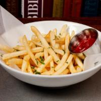 French Fries · Shoestring fries, New Orleans cajun seasoning, parsley, lemon, ketchup