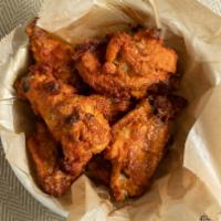 Hot Wings (8 Pcs) · 1lb traditional buffalo wings, baked fresh. Served with 2 sides of ranch and 1 side of wing ...