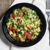 Shirazi Salad · Chopped cucumbers, tomatoes and onions with our homemade citrus dressing (olive oil, fresh l...