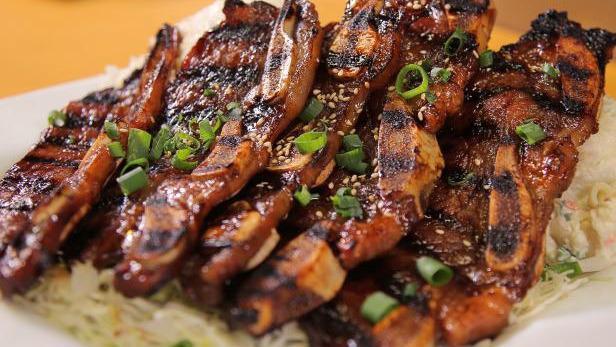 Regular Bbq Short Ribs · Juicy beef short ribs marinated in our house bbq sauce and grilled to perfection.