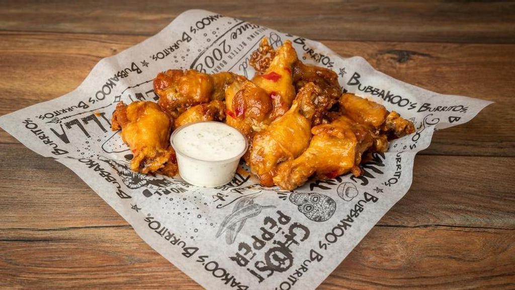 Bone In Wings · Bone-in wings tossed in choice of sauce. Never breaded! Fried a bit well done...as they should be!