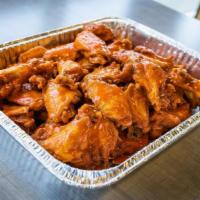 Bone In Wing Party Tray · Bone in Wings tossed in your choice of flavor. Perfect for any party!