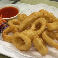 Crispy Calamari · Deep fried battered calamari served with sweet chili sauce.