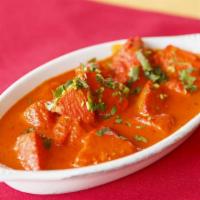 Chicken Tikka Masala · Boneless tandoori chicken tikka cooked in clay oven, in special curry and yogurt sauce.