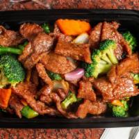 Beef With Broccoli · Stip of tender beef toss-cooked with crispy green broccoli, and carrot.