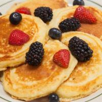 Buttermilk Pancakes · Contains dairy, gluten and egg. Salted butter and maple syrup.