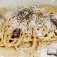 Spaghetti Carbonara · Contains dairy, gluten and egg. Pancetta and pecorino.
