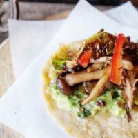 Wild Mushroom Taco · Brussels sprouts, guacamole, and soy sauce.