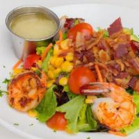 Shrimp Salad · Marinated grilled shrimp atop a bed of mixed greens, corn, cherry tomatoes, carrots, bacon, ...
