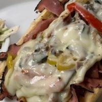 Pastrami Philly · Premium pastrami chopped and topped with grilled onions, peppers, mushrooms and melted Jack ...