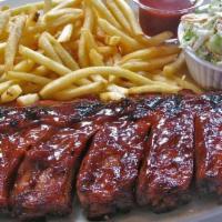 Baby Back Ribs · Char-grilled and glazed with Milton's own BBQ sauce. Served with fries, grilled corn on the ...
