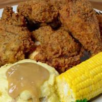 Southern Fried Chicken · 4 large pieces of crispy golden fried chicken, homemade mashed potatoes and corn on the cob
