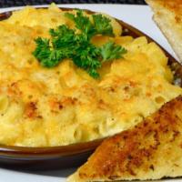 Grown-Up Mac & Cheese · A creamy sauce of cheddar, provolone, and parmesan cheeses baked with tender elbow macaroni ...