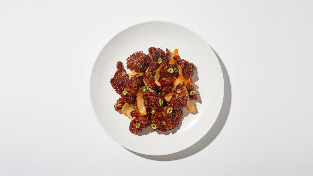 Mongolian Beef · Stir-fried tender steak with scallions, onions, mushroom, and soy glaze.