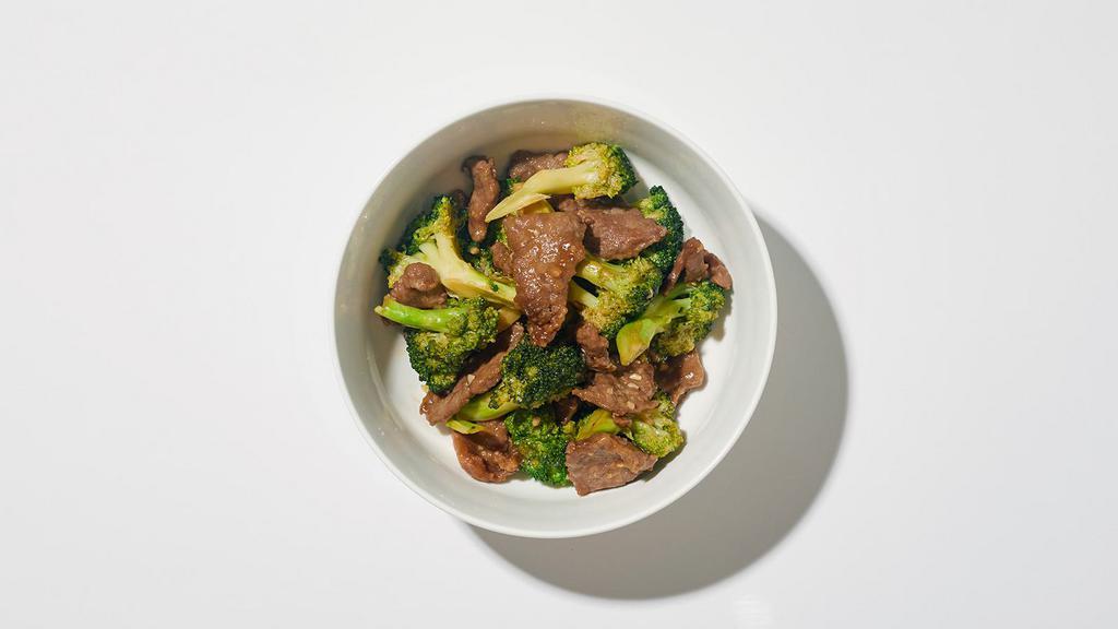 Beef And Broccoli · Beef sautéed with broccoli, white onions, and carrots in a light garlic sauce.