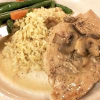 Chicken Marsala · Sautéed in delicious marsala mushroom wine sauce and served with rice pilaf.