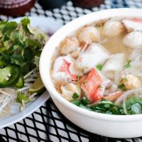 Hủ Tiếu Hải Sản · Shrimp, squid and fishball seafood soup with rice noodle.