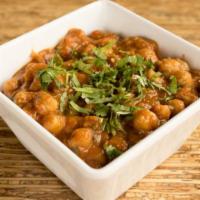 Chana Masala · Garbanzo beans in a flavorful lightly spiced sauce.