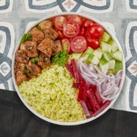 Spicy Combo Bowl · The spicy combo you've been looking for. Tender chicken and shawarma over rice and smothered...