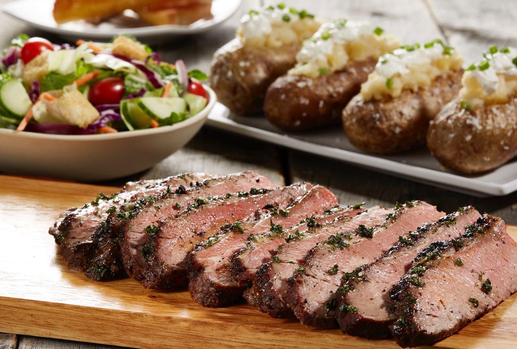 Sliced Tri Tip · Comes with your choice of 2 sides. 
Fries, Mashed Potatoes, Rice Pilaf, or Baked Potatoes