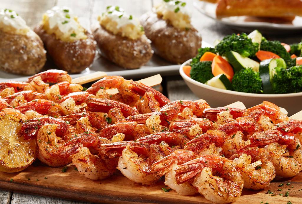 Shrimp Skewers · Comes with your choice of 2 sides. 
Fries, Mashed Potatoes, Rice Pilaf, or Baked Potatoes