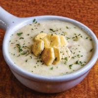 Cup Of Soup · Vegetable beef, clam chowder and the soup of the day.