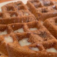 Churro Waffle · Churro waffle and topped with lechera drizzle. Served with one small plate.