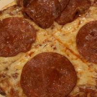 Meat Lovers · Pepperoni, sausage, salami, Canadian bacon, ground beef and bacon.