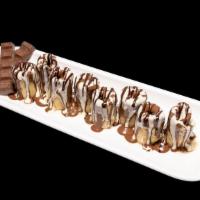 Sushi Crepe · sushi style crepe wrapped in Kinder chocolate, topped with Belgium chocolate and European co...