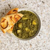 Saag Aloo · Fresh chopped spinach and potatoes cooked with special herbs and spices. comes with rice.
