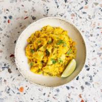 Aloo Gobhi · Potatoes and cauliflower cooked with ground spices and curry sauce.