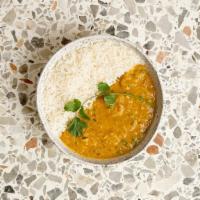 Daal Turka · Lentils cooked with tomatoes, onions and garlic with ground spices. comes with rice.