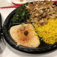 Chicken Kabob Plate · Popular. Layers of marinated chicken cooked on a spit thinly sliced.