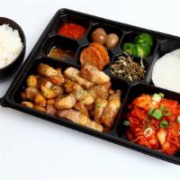 Pork Belly Lunch Box · Pork Belly, ham, stir-fried anchovy, pepper, garlic, ssamjang, wasabi, kimchi, boiled egg