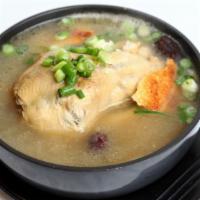Ginseng Chicken Soup W/ Scorched Rice · The body cavity of a mall chicken is stuffed with glutinous rice, young ginseng roots, and j...